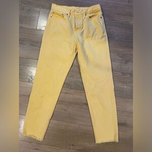 Pale yellow crop jeans